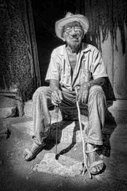 Andrew Xenios; Lorenzo, A Mayan At 100 Y..., 2012, Original Photography Black and White, 12 x 18 inches. Artwork description: 241  This is Lorenzo, he is a Mayan living in a mud walled thatch roofed house he built himself 85 years earlier.  ...