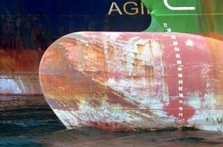 Ellen Spijkstra; 34, 2001, Original Photography Color, 41 x 27 inches. Artwork description: 241 The bow of a cargo ship in front of tanker. Rusty orange, bright green white and dark blue.Laminated with a clear, semi- matt UV protection layer. ...