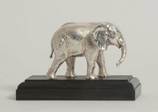 Heinrich Filter; Elephant In Sterling Silver, 2013, Original Sculpture Other, 14 x 9 cm. Artwork description: 241 Baby elephant sculpture in Sterling silver on ebony base by Heinrich Filter Sterling silver weight approx 580grams also available in bronze.  ...