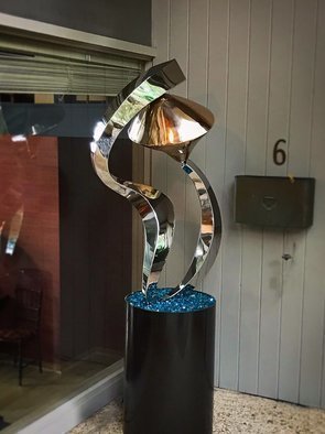 Hunter Brown; Celestial, 2019, Original Sculpture Steel, 30 x 78 inches. Artwork description: 241 Contemorary sculpture design, constructed in 316 stainless steel and bronze, with mirror polished finish. The piece is approx 4 H and is mounted on 30  steel base. The sculpture is suitable for interior and exterior placement. ...