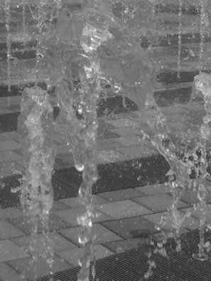 Jeanette Locher; Upward Water, 2008, Original Photography Color, 12 x 18 inches. Artwork description: 241  I took this along the riverwalk in Detroit- they have these fountains of water that the kids play in, it was windy that day and the water looked like it was flowing up- hence the title of the photo ...