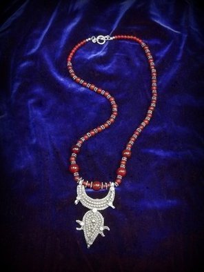 Judith Mitchell; Mythogems VIII, 2012, Original Beads,  27 cm. Artwork description: 241  An antique Tuareg sterling pendant with the crescent moon; dark blood- red carnelian beads and sterling beads like stars. This is worthy of Scheherazade' s jewel- chest. ...
