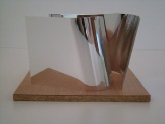 Mrs. Mathew Sumich; Stainless Steel 1, 2009, Original Sculpture Steel, 18 x  inches. Artwork description: 241  Stainless Steel on wood base, table top size mockette ...