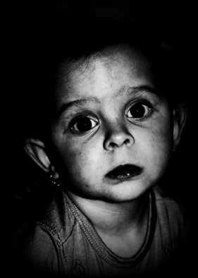Maciej Wysocki; Julinka, 2013, Original Photography Black and White, 30 x 42 cm. Artwork description: 241 child, girl, eyes, black eyes...