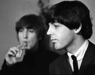 Paul Berriff; Fade Out, 1964, Original Photography Black and White, 33 x 23 inches. Artwork description: 241  John Lennon sips a lemonade as he and Paul McCartney take a few moments to relax before their concert at the Odeon Theater Leeds England on 22 October 1964.  This is a limited edition and comes signed on the verso by the photographer Paul Berriff with limited ...
