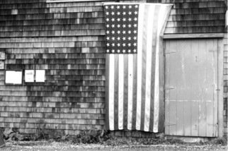 Ruth Zachary; Island Patriot, 2012, Original Photography Black and White, 10 x 8 inches. Artwork description: 241 Forty- eight star American flag displayed on rustic shaker shingled New England barn.  Monhegan Island, Maine.   ...