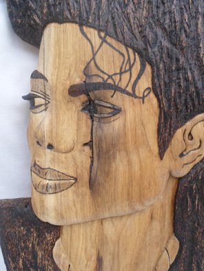 Stefan Irofte; Sculpture Wood Michael Jackson, 2014, Original Sculpture Wood, 27 x 42 cm. Artwork description: 241   A unique and original art work done by hand in wood with distinction. This is a Michael Jackson portret made in oak wood. Initially the wood was in the form of a thick plank and it has been cut in three equal parts and then join together. ...