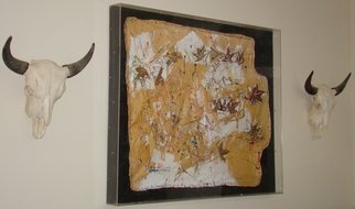 Skull Mcleod; Buffalo Robe, 2016, Original Mixed Media, 66.5 x 54.5 inches. Artwork description: 241  Exploring his Native American roots, Skull McLeod has excavated through layers of paper, paint and found objects to recreate a traditional story robe, framed in clear acrylic and accompanied by two actual buffalo skulls. ...