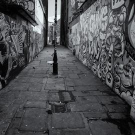 Barry Hurley: 'paint alley', 2018 Black and White Photograph, Urban. Artist Description: An Alley from the East End of London. Originally whitewashed, the locals added their own touch...