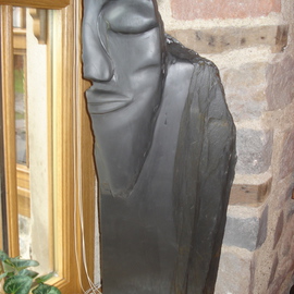 Matthew Billington: 'Pilgrim', 2008 Stone Sculpture, Abstract Figurative. Artist Description:  The bearded pilgrim stands and stares, one eyed. Or does he sleep. Is he cowled like a monk or helmeted like a warrior. This piece further explores the theme of fluidity in stone, contrasting the sculpted polished forms with the natural shape and texture of the slate of ...