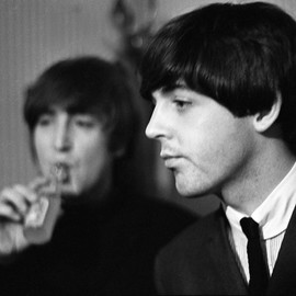 Paul Berriff: 'Fade Out', 1964 Black and White Photograph, Music. Artist Description:  John Lennon sips a lemonade as he and Paul McCartney take a few moments to relax before their concert at the Odeon Theater Leeds England on 22 October 1964.  This is a limited edition and comes signed on the verso by the photographer Paul Berriff with limited edition ...