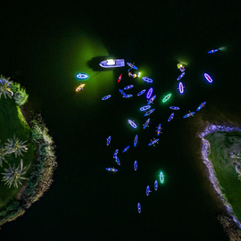 Raf Willems: 'neon paddle', 2018 Color Photograph, Abstract. Artist Description: Aerial Shot of people in kayaks and on paddle boards, decorated with neon.  Night shot on a lake.  High End Acrylic Print with aluminium floating frame.  Limited Edition of 100. ...