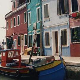 Ruth Zachary: 'Colors of Burano II', 1997 Color Photograph, Boating. Artist Description: Island of Burano, Venice, Italy.  Famous for its hand- made lace and its colorful charm. Whimical little boat dressed- up in red, yellow and blue.  Backed by homes decked out in rose, turquoise and lavendar. Variety of geometric shapes contrast with the wonderful curve of the boat.  Limited ...