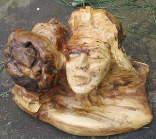 John Clarke; Reunion, 2015, Original Sculpture Wood, 20 x 11 inches. Artwork description: 241 Two faces, dark and light, in two connected cherry burls...