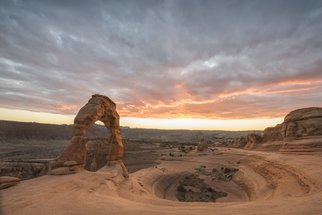 Jon Glaser, 'Light On The Arch', 2015, original Photography Color, 56 x 38  x 1 inches. Artwork description: 1911  After walking and stumbling 1 1/ 2 miles to delicate arch viewpoint, located in Arches National Park in Utah, I was able to capture this moment. The sun had just set below the horizon when the clouds exploded in color.This limited- edition photograph, measuring approximately 40