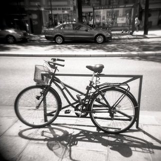 Karen Morecroft; A Bicycle In Paris, 2009, Original Photography Black and White, 5 x 5 inches. Artwork description: 241  A bicycle on the city streets of Paris, France. Photo mounted on black card ( approx 6x8) ...