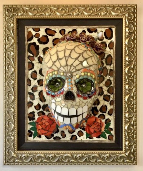 Clark-camargo Mary; Gato Mujer, 2019, Original Mosaic, 24 x 27 inches. Artwork description: 241 Large 3D wall hanging consisting of an elegantly framed mosaic skull made from hand cut glass, glass tiles, porcelain, found objects and beads.  The theme is Dia de los Muertos, a woman who was mysterous and cat like. ...