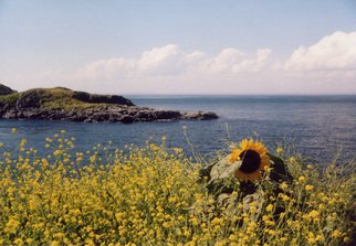 Ruth Zachary, 'Sunflower Summer', 2012, original Photography Color, 10 x 8  inches. Artwork description: 3495 Recently someone remared- - boy that sunflower has personality! Sunflower above a bed of yellow mustard ( I think) , backed by blue sea, sky and billowy clouds. Monhegan Island, Maine.  Larger size available ( 11 x 14, $98) . ...
