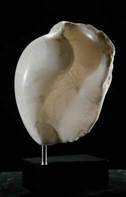 Terry Mollo, 'Mystic', 2006, original Sculpture Stone, 10 x 15  x 7 inches. Artwork description: 1911 Inspired by the organic vs. inorganic nature of sea life, shells and sea conches, this piece is carved from a very translucent white alabaster. Light flows through to show a mystical floating embryonic interior. It is mounted on a plain black matte lucite base. ...