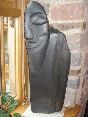 Matthew Billington: 'Pilgrim', 2008 Stone Sculpture, Abstract Figurative.  The bearded pilgrim stands and stares, one eyed. Or does he sleep. Is he cowled like a monk or helmeted like a warrior. This piece further explores the theme of fluidity in stone, contrasting the sculpted polished forms with the natural shape and texture of the slate of North Wales...