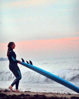 Haile Ratajack: 'surfer girl', 2022 Color Photograph, Beach. Surfer spotted taking the time to appreciate the views of the ocean...