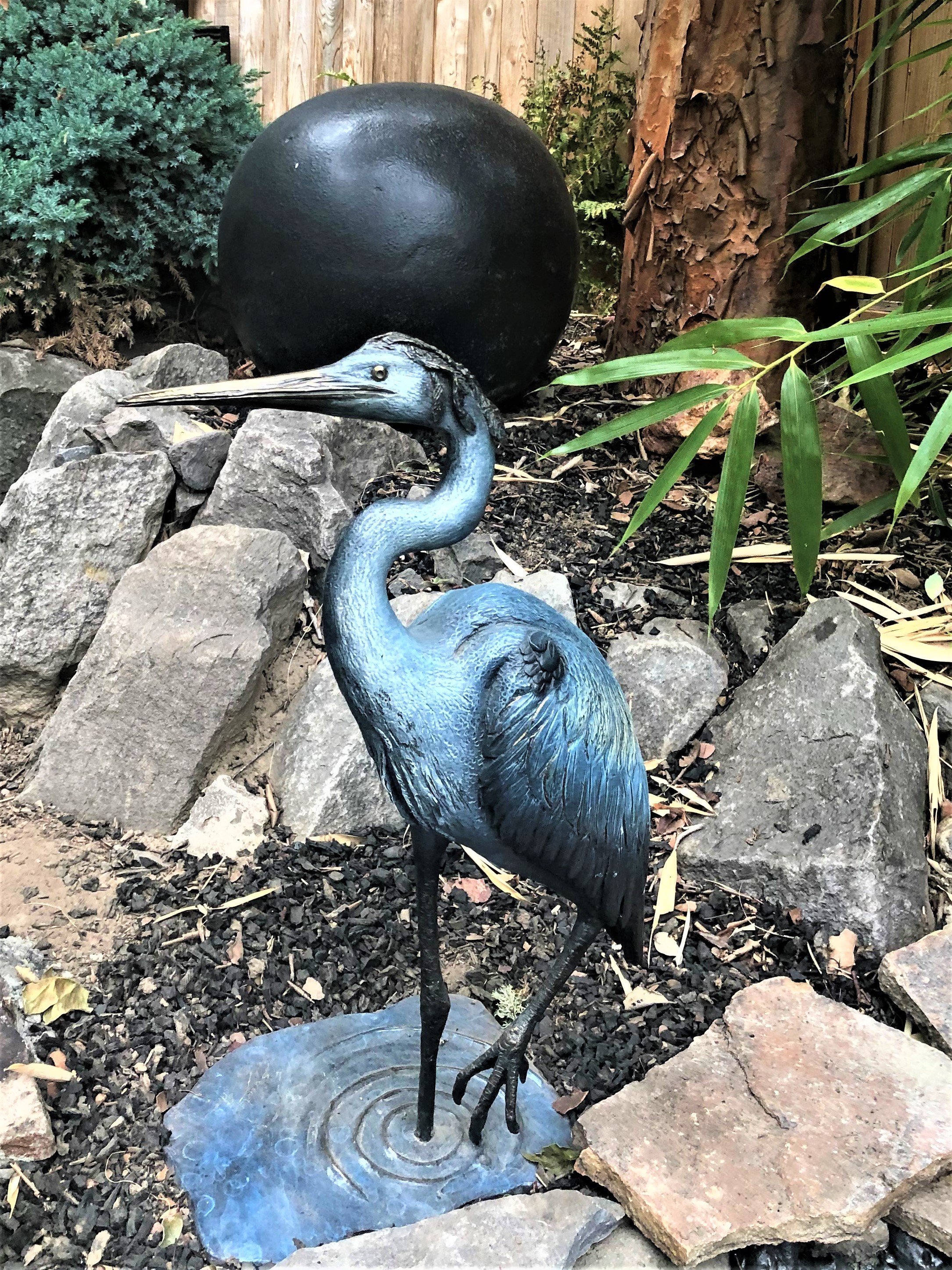 Joe Jumalon: 'Serentiy Blue Heron', 2019 Bronze Sculpture, Birds. The Serenity Blue Heron is a limited edition of exquisite wildlife art.  Blue herons are waders, typically living along coastlines, in marshes, or near the shores of ponds and streams.  Most often they stand perfectly still in the water which creates a calm, even serene, scene.  These limited edition hand ...