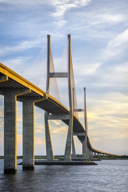 Jon Glaser: 'Lanier Bridge at Sunset', 2016 Color Photograph, Architecture.  While in south Georgia, near Jekyll Island, this photograph showed the leading lines on the Sydney Lanier Bridge. This limited- edition photograph, measuring approximately 16x24, is printed on fade- resistant Museo Silver Rag paper that has no optical brighteners. The image has been varnished with a protective coating that protects...