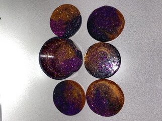 Lacey Griffin: 'homemade halloween coasters', 2022 Crafts, Holidays. - Sparkly mixtures of purple, black and orange epoxy resin to create a durable, festive coaster set thataEURtms perfect for the upcoming spooky season. - Set of 5, with included holder- Made to order and customizable. Message me if you have any requests such as color change, shape change  also available...