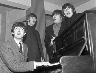 Paul Berriff: 'The Beatles The Chorus', 1963 Black and White Photograph, Music.  The Beatles enjoy a sing song around a piano in their dressing room at the Gaumont Theater in Bradford Yorkshire England before their Christmas concert on 21 December 1963.  This is a limited edition and is signed on the verso by photographer Paul Berriff with limited edition number and authenticity...