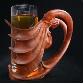 beer glass with wooden holder By Pavel Sorokin