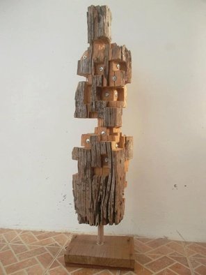 John Paul Dalisay: 'People are people', 2011 Wood Sculpture, Abstract Figurative.  Recycled old molave wood post   ...