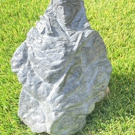 Rebecca Patchett: 'modanna', 2022 Stone Sculpture, History. Artist Description: Mother Marry and baby JesusSculpture in black rock, one side sculpture and back side rock is in its original un touch , natural organic form...