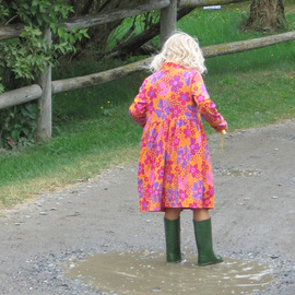 Ruth Zachary: 'Puddle Girl', 2012 Color Photograph, Children. Artist Description: Little girl, blond curls, flowery red dress, tall green boots and a puddle! Made for each other! Larger size available ( 11 x 14, $98) .   ...