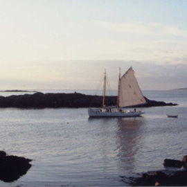 Ruth Zachary: 'Sailing By', 2000 Color Photograph, Sailing. Artist Description:  Dusk approaches, and the sail boat winds her way between the small islands heading to port.  One sail up, dingy trailing behind. Peaceful, atmospheric.  Off the coast of Maine.  5 x 7 in a 11 x 14 acid free mat.  Signed and titled.  Larger image available.  Enjoy!  ...