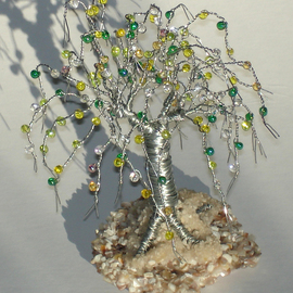Sal Villano: 'beaded on beach sculpture', 2017 Wire Sculpture, Beach. Artist Description: Beaded on Beach, Wire Tree Sculpture.5 H x 3. 5 W x 3. 5 D Made of  26 gauge galvanized steel wire with yellow, white, clear and green colored glass fringes beads that are wired onto each branch. The tree is mounted on a base of tiny ...